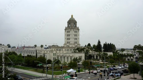 Aerial Forward Ascending Shot Of Famous Beverly Hill Town Hall In City Against Clear Sky - Beverly Hills, California