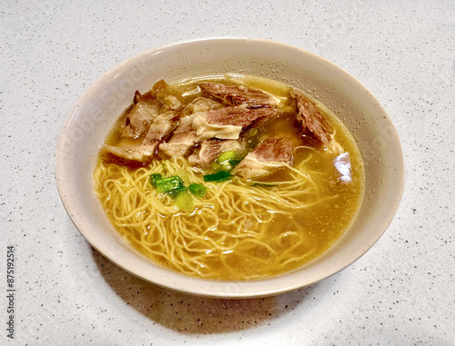 traditional famous authentic hong kong chinese beef brisket noodle soup street food stall in local restaurant at kowloon tsim sha tsui hong kong photo