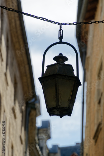 View of the streets and houses of the French town of Perigeuex in France in sunshine photo