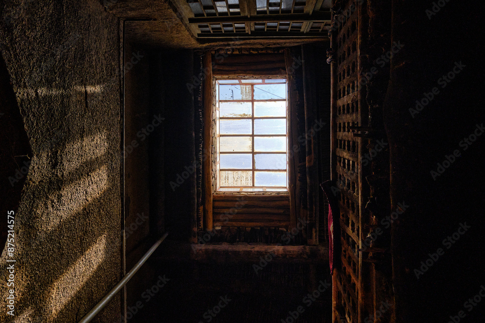 Seeing of the sky from the window on roof. being stuck and loneliness concept photo. Seeing of the sky from the window on roof. being stuck and loneliness concept photo.