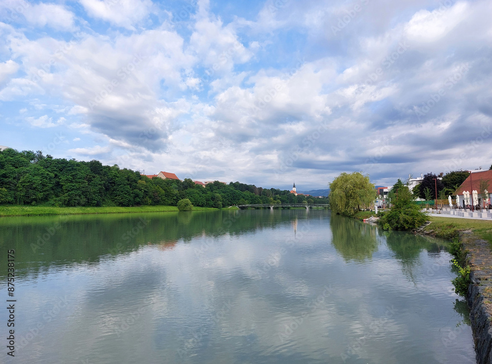 river Drava in Maribor in Europe. Cloudscape. Summer river Drava in Maribor in Europe. Cloudscape. Summer