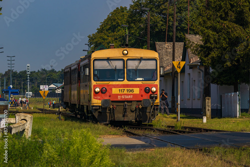 A Bzmot passes out of Tapolca station. photo