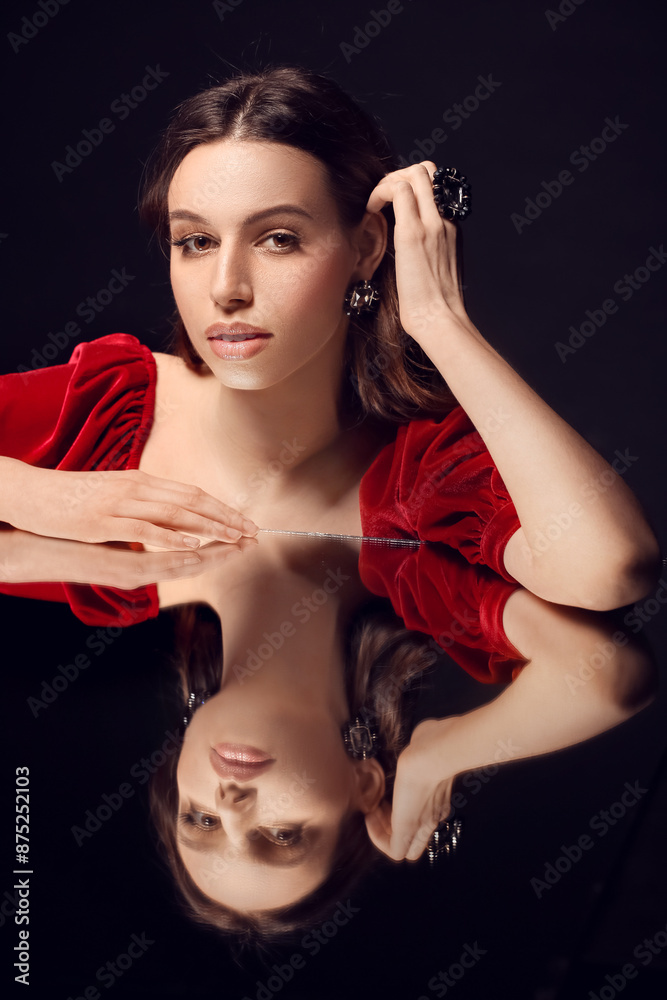 Woman with stylish accessories on black background Woman with stylish accessories on black background