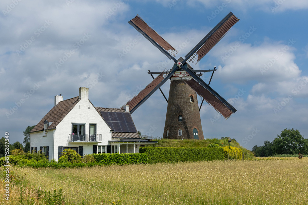 Windmill De Roosdonck, modern house with solar panels Windmill De Roosdonck, modern house with solar panels