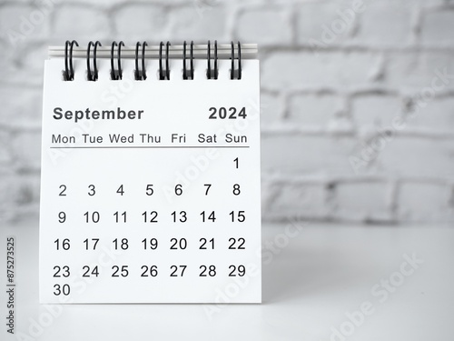 September 2024 white monthly desk calendar on a table