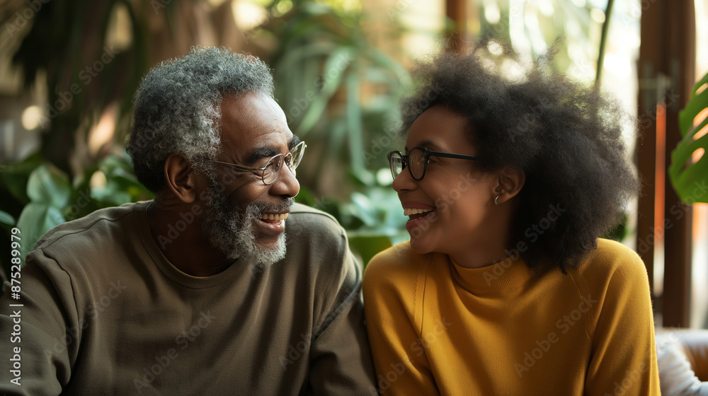 Happy senior African American couple laughing together outdoors Happy senior African American couple laughing together outdoors