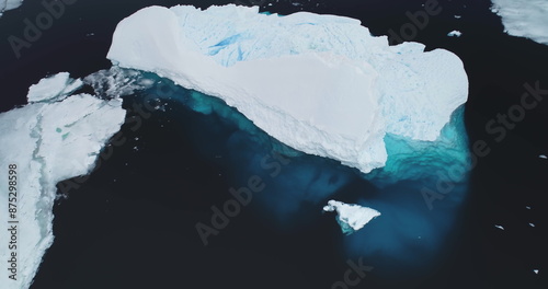 Konstfotografi Massive iceberg melting underwater floats cold blue ocean in Antarctica