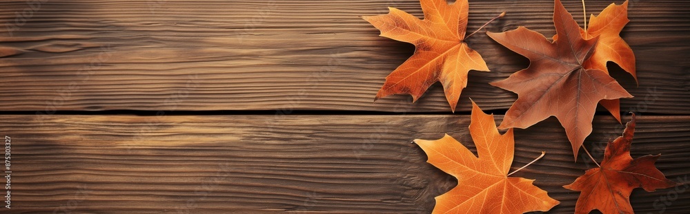 Atumnal leaves on wooden background. Autumn leaves over wooden background with copy space. Autumn maple leaves over wooden background. Atumnal leaves on wooden background. Autumn leaves over wooden background with copy space. Autumn maple leaves over wooden background.