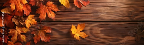 Atumnal leaves on wooden background. Autumn leaves over wooden background with copy space. Autumn maple leaves over wooden background. photo