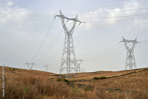 Torres y redes de distribución en la inmediaciones del pueblo de  Alcántara, Cáceres (Extremadura), España. photo