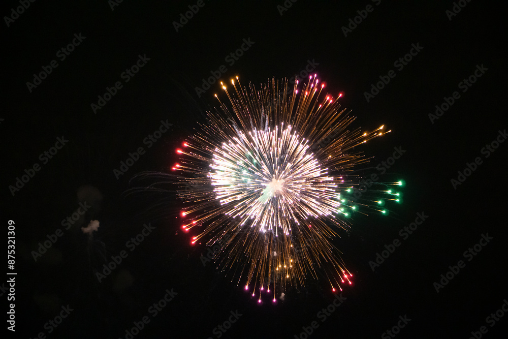 Huge multi coloured fireworks on the dark sky background. Fireworks festival celebration from Loto Quebec. Huge multi coloured fireworks on the dark sky background. Fireworks festival celebration from Loto Quebec.