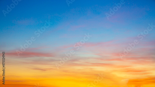 Fototapeta Naklejka Na Ścianę i Meble -  Clouds and orange sky,Real majestic sunrise sunset sky background with gentle colorful clouds without birds.Panorama, large 