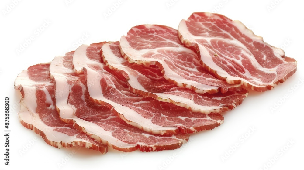 Sliced cured meat arranged on a white background, showcasing marbling and texture, perfect for culinary and gastronomic uses. Sliced cured meat arranged on a white background, showcasing marbling and texture, perfect for culinary and gastronomic uses.