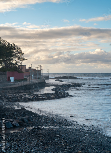 El Puertillo high tide seascape at sunset . vertical composition photo