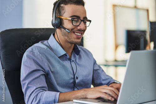 Telemarketing, laptop and man consultant in office with smile for positive client feedback on service. Headset, contact us and male technical support agent with computer for internet crm consultation