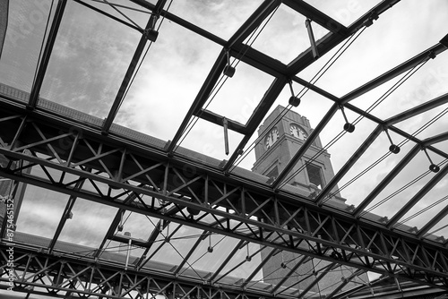 Steel structure of a glass roof and clock tower in a restored old brewery in Poznan