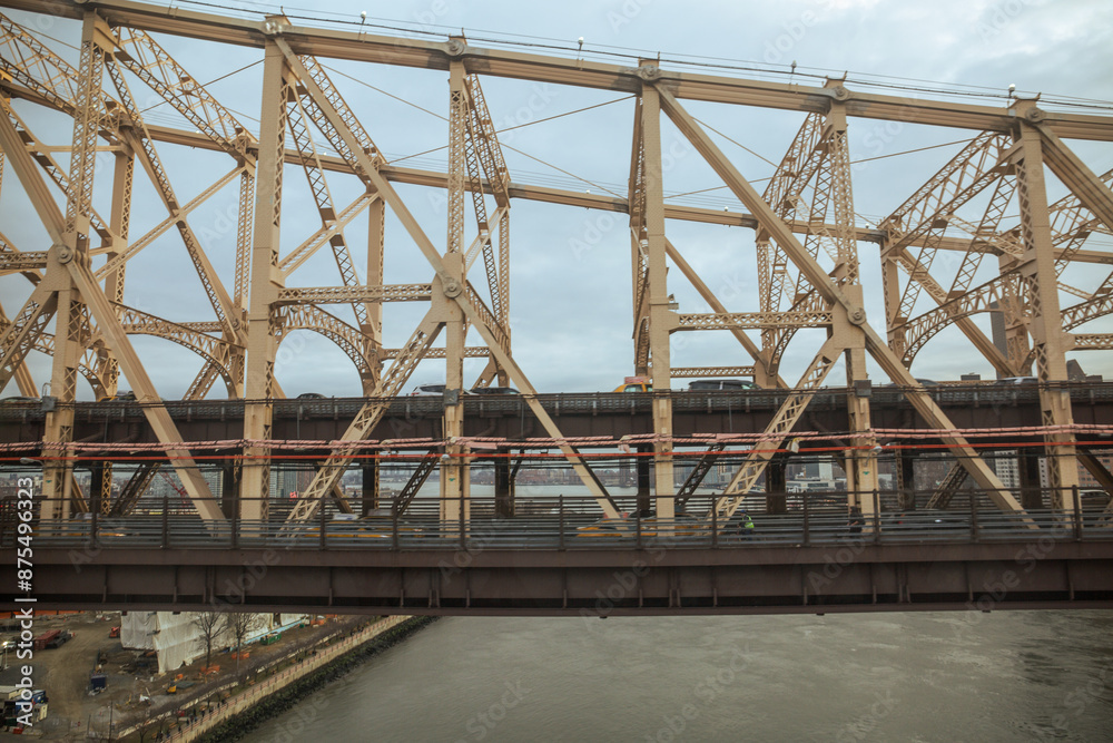 Aerial shot of the side of the 59th St Bridge aka the Queensboro Bridge aka the Ed Koch Bridge that connects Queens to Manhattan 