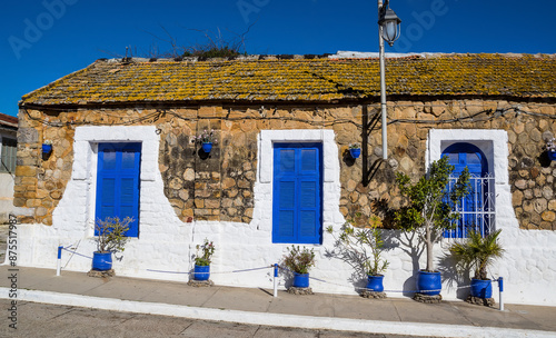 Amazing view of house with blue windows in Rabat. Location: Rabat, Morocco, Africa. Artistic picture. Beauty world photo