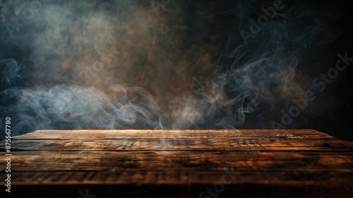 Old wood table with smoke in the dark background.