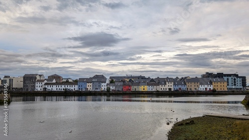 Obraz na płótnie Cloudy Evening cityscape scenery, colourful houses at Long walk, Claddagh by Corrib river at Galway city, Ireland w salonie