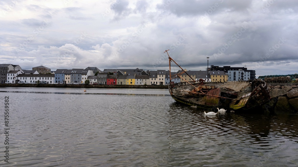 Cloudy Evening cityscape scenery, colourful houses at Long walk, Claddagh by Corrib river at Galway city, Ireland