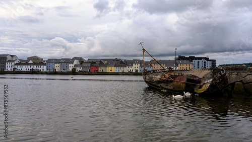 Obraz na płótnie Cloudy Evening cityscape scenery, colourful houses at Long walk, Claddagh by Corrib river at Galway city, Ireland w salonie