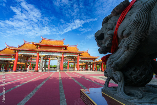 pier stretching into the sea at sunset with a serene sky and clouds above the ocean