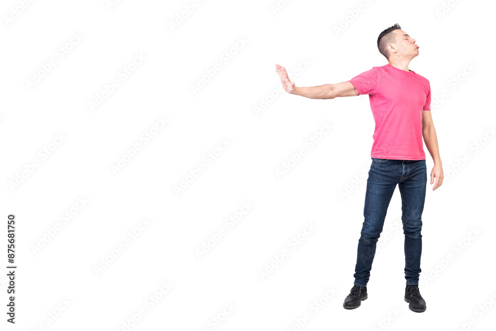 Angry male showing stop gesture and pouting lips in white studio Angry male showing stop gesture and pouting lips in white studio