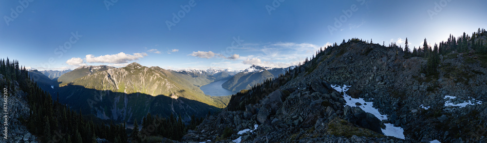 Aerial Canadian Mountain Landscape. Sunny Cloudy Day. BC, Canada. Aerial Canadian Mountain Landscape. Sunny Cloudy Day. BC, Canada.
