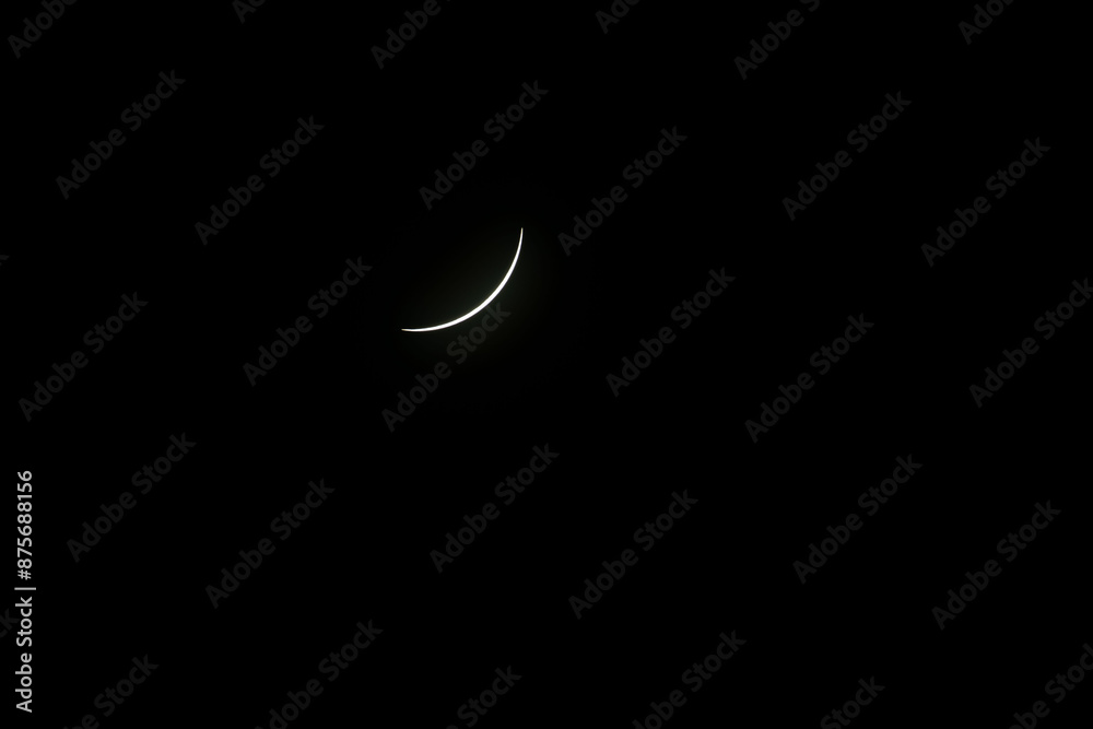 Total eclipse waning as moon begins to uncover the sun Total eclipse waning as moon begins to uncover the sun