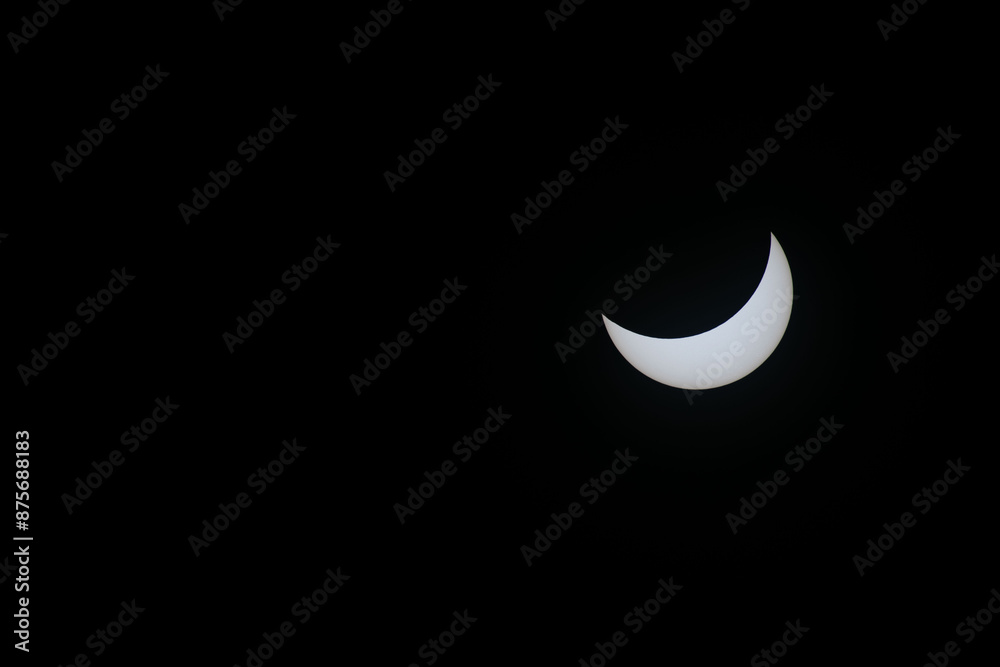 Total eclipse waning as moon begins to uncover the sun Total eclipse waning as moon begins to uncover the sun