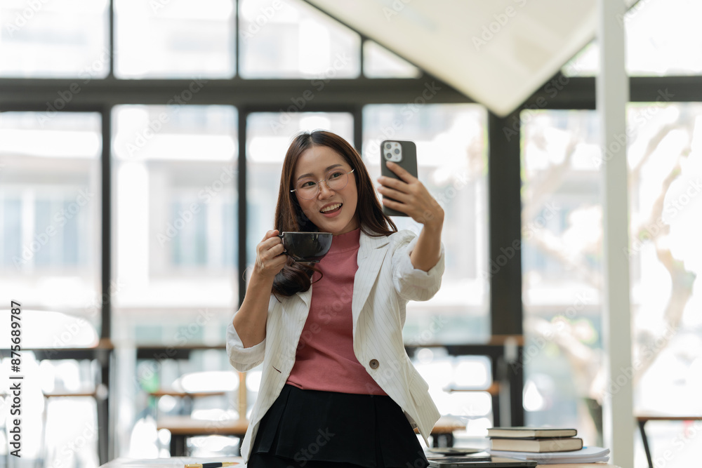 Businesswomen Working and talking about work documents at the office. Businesswomen Working and talking about work documents at the office.