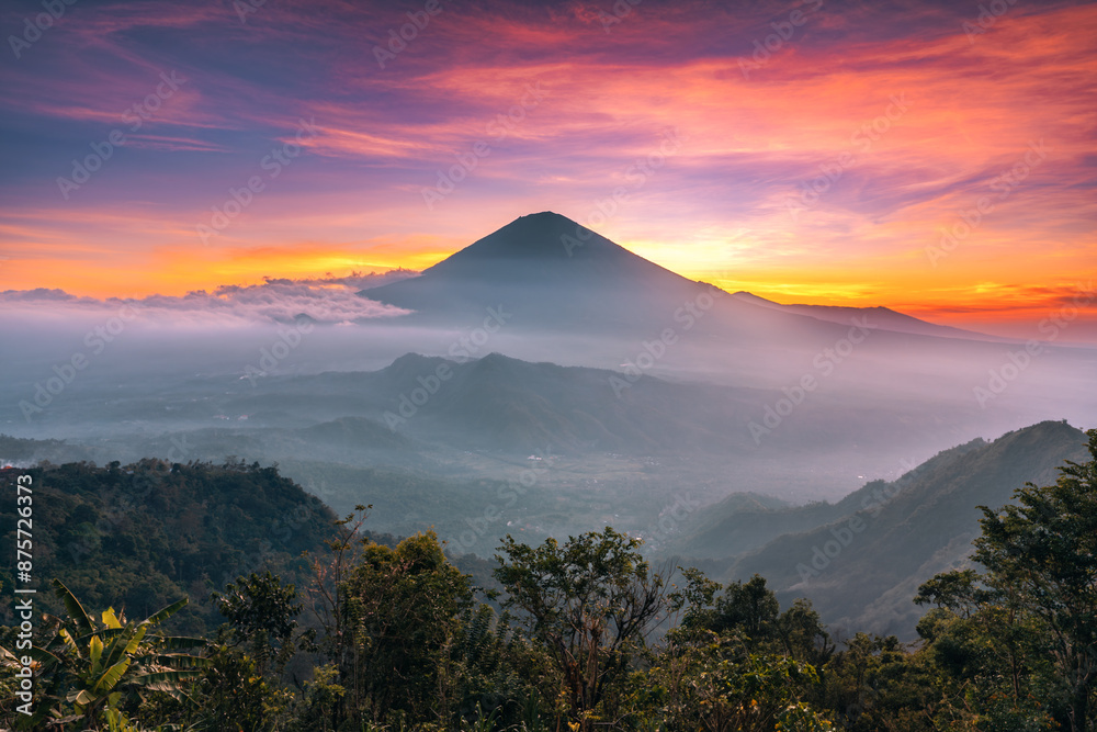 Morning view at one of the most recognizable sights island Bali, volcano Agung, on the top of which according to legend live spirits protecting the island Bali Indonesia Morning view at one of the most recognizable sights island Bali, volcano Agung, on the top of which according to legend live spirits protecting the island Bali Indonesia