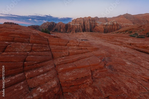 Rocky landscape and mountain range at sunrise at Snow Canyon, Ivins, Utah, United States of America. photo