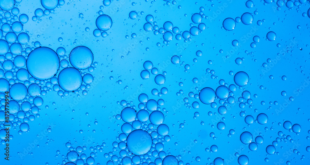Abstract background of water drops blue bubbles of oil in liquid Abstract background of water drops blue bubbles of oil in liquid