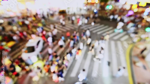 Wallpaper Mural Defocused many people walking on the street at night Torontodigital.ca