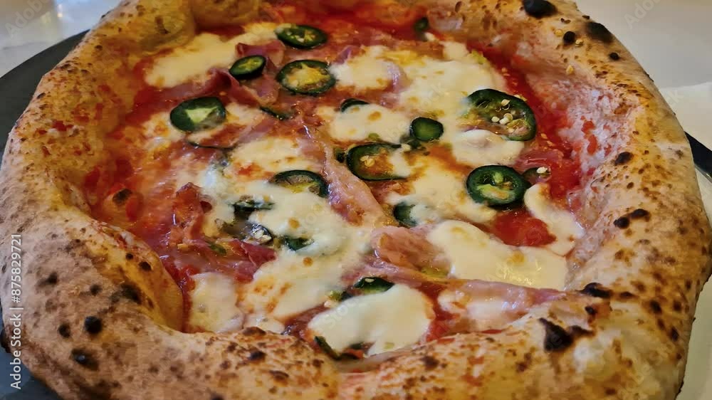 Spicy Neapolitan pizza. Neapolitan pizza with spicy peppers. Spicy Neapolitan pizza. Neapolitan pizza with spicy peppers.