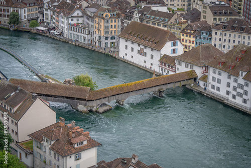 amazing beautiful city where tourist can see architecture old town city cow , river cruising wooden bridge at Lucerne Switzerland   photo