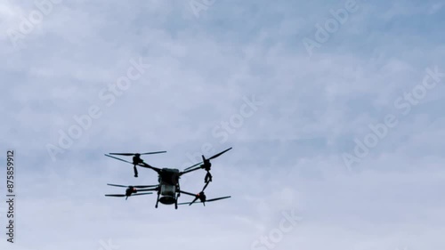 Agriculture drone fly to sprayed fertilizer on the sweet corn fields