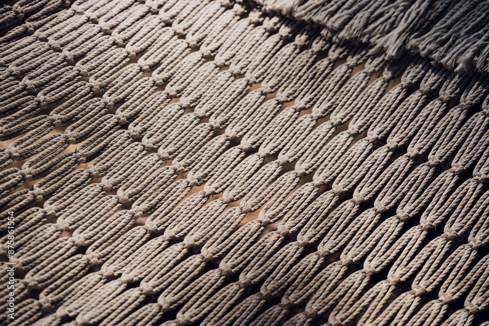 A detailed view of a knitted textile featuring a geometric design A detailed view of a knitted textile featuring a geometric design