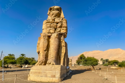 Colossi of Memnon, two massive stone statues representing the pharaoh, Luxor, Egypt photo