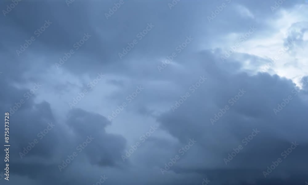 Stormy Night Sky with Moonlight Breaking Through, Perfect for Dramatic and Moody Themes Stormy Night Sky with Moonlight Breaking Through, Perfect for Dramatic and Moody Themes
