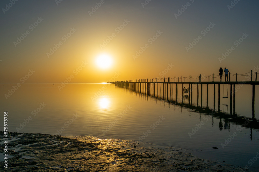 Long jetty at sunrise on the Red Sea in Egypt Long jetty at sunrise on the Red Sea in Egypt