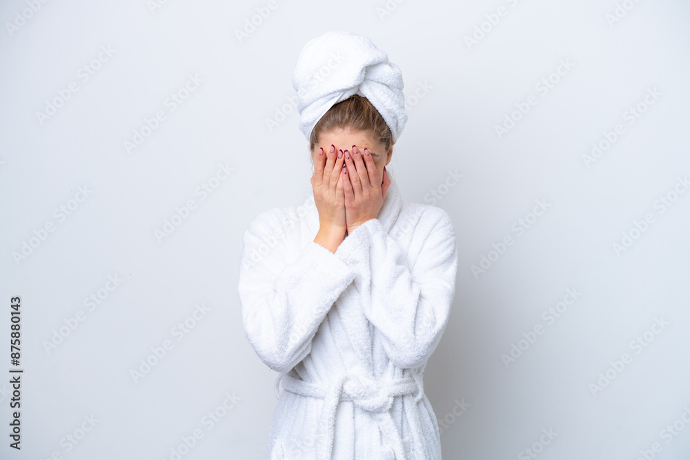 Teenager Russian girl in a bathrobe isolated on white background with tired and sick expression Teenager Russian girl in a bathrobe isolated on white background with tired and sick expression