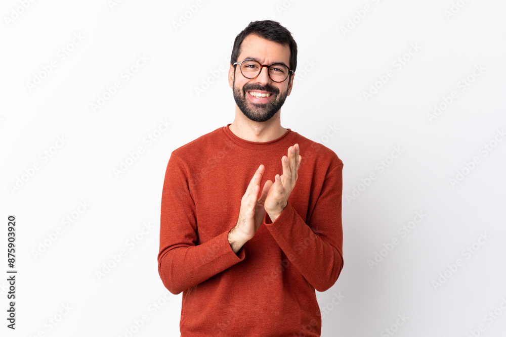 Caucasian handsome man with beard over isolated white background applauding after presentation in a conference Caucasian handsome man with beard over isolated white background applauding after presentation in a conference
