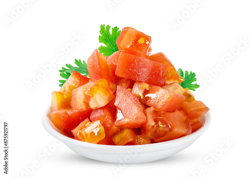 Diced tomato with cilantro leaves in a white ceramic bowl
