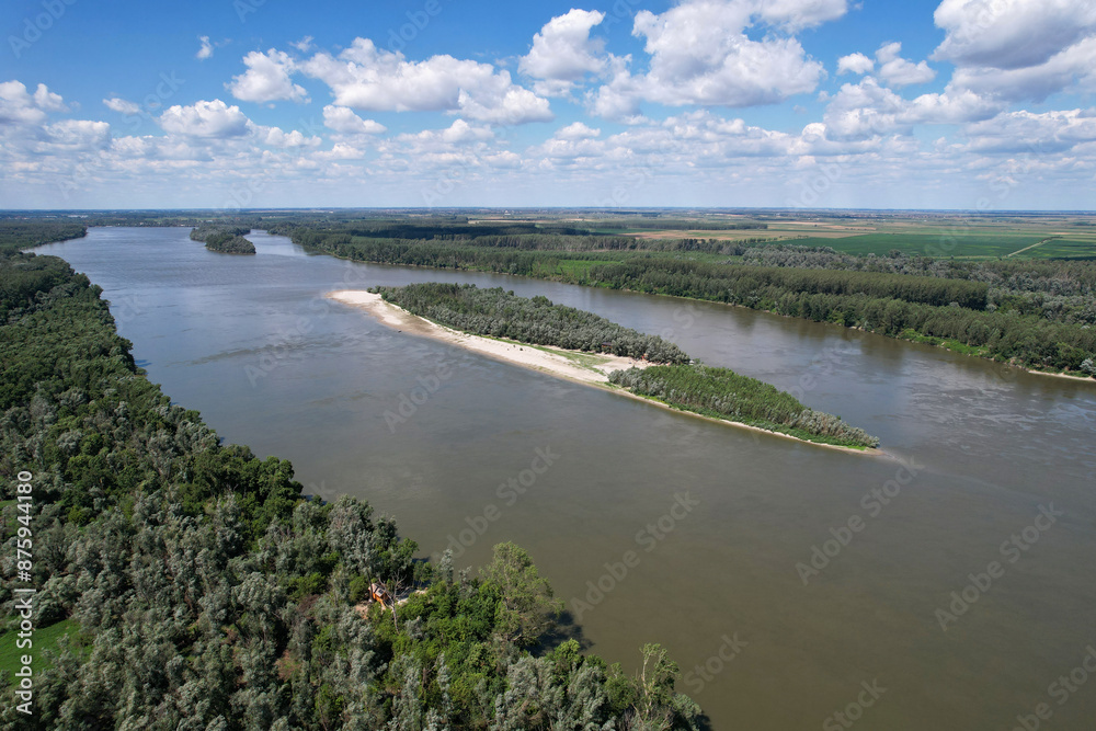 Birds eye view of Danube river with Majmunsko Island in the middle on sunny day. Surroundings of Sremski Karlovici, Serbia. Birds eye view of Danube river with Majmunsko Island in the middle on sunny day. Surroundings of Sremski Karlovici, Serbia.