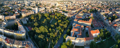 Bild auf Leinwand Panoramic aerial view of Novi Sad and Dunavski Park at sunrise