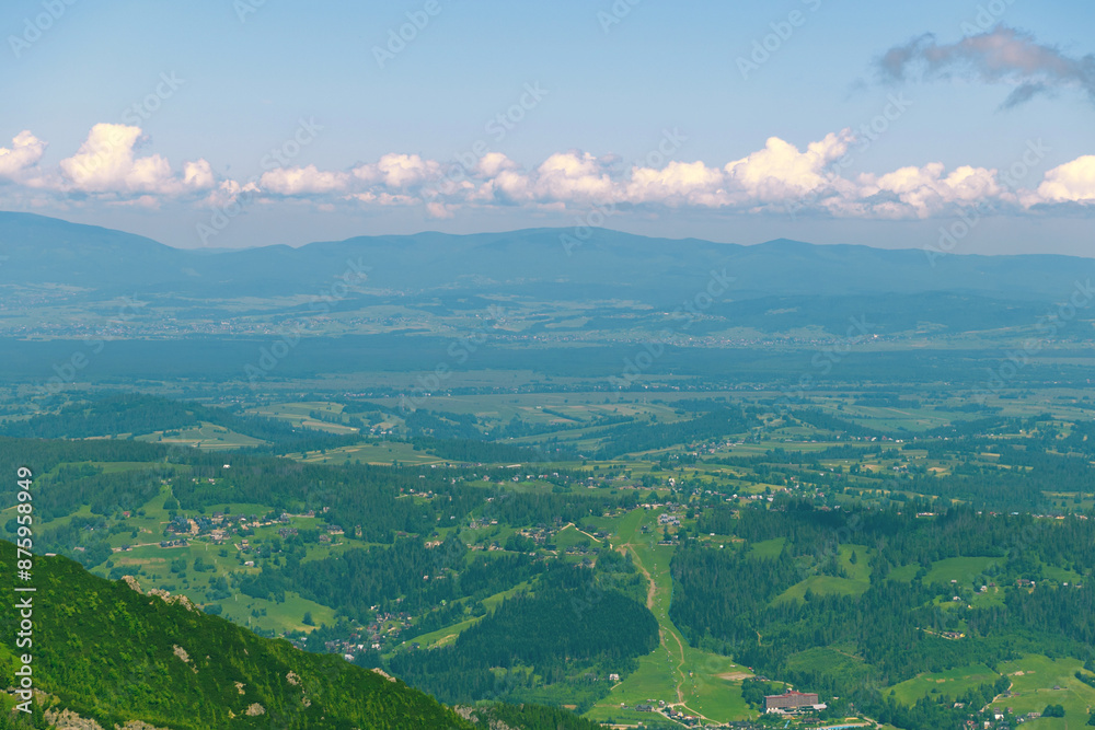 Fototapeta premium Beautiful mountain landscape overlooking the valley and the city. Tatra Mountains, Zakopane, Poland. Summer 2024.