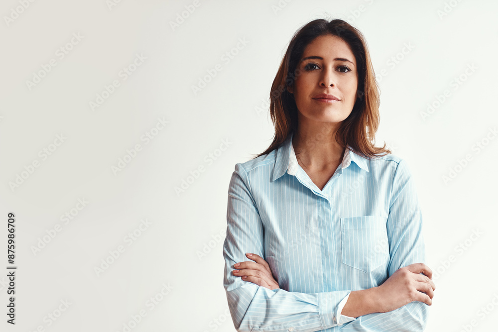 Businesswoman, portrait and serious with arms crossed in studio with mockup, confidence or career pride. Professional designer, entrepreneur or face of employee in startup company on white background Businesswoman, portrait and serious with arms crossed in studio with mockup, confidence or career pride. Professional designer, entrepreneur or face of employee in startup company on white background